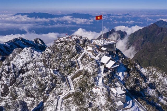 Fansipan peak covered with white snow during winter days.