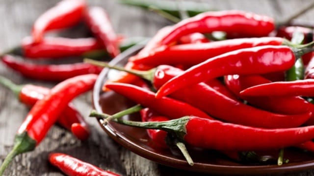 Chili peppers spice up Vietnamese vegetable dishes, adding a signature fiery kick